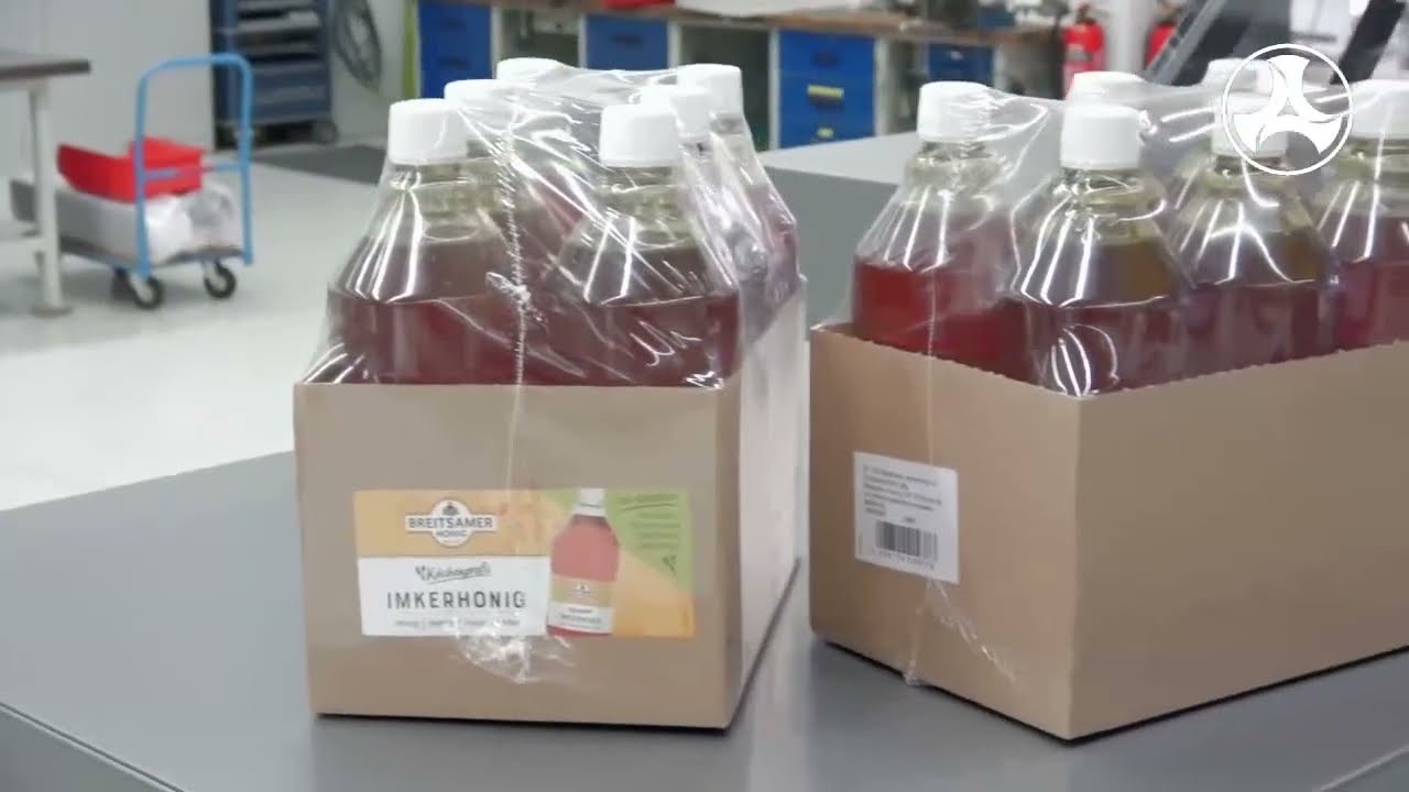 Shrink Wrapping Trays of Bottles and Jars (Kallfass Universa 500 Automatic Shrink Wrap Machine)