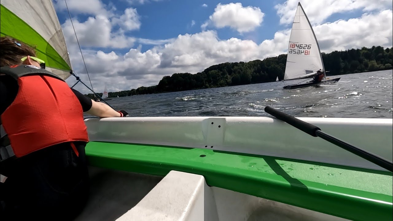 Two hobbits sailing an RS Quest overpowered by 20 knot gusts