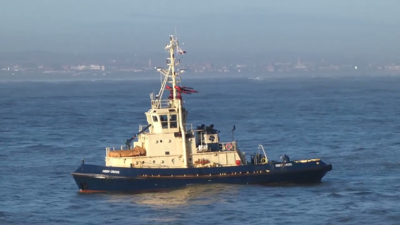 Tugboats bring Crude Oil Tanker ALFA ALANDIA into the river Tees