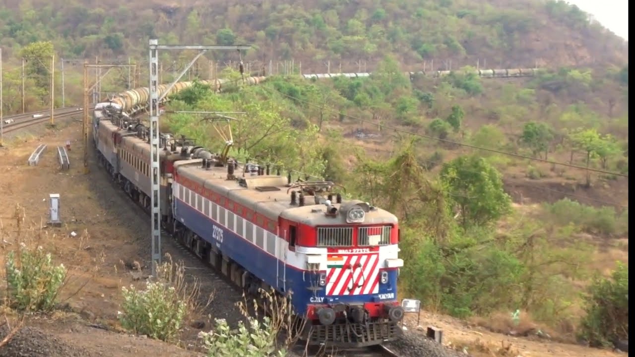 Yesvantpur AC Exp crossing a long BTPN Tanker Freight in Bhor Ghat