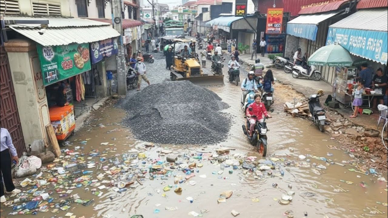 Process build Foundation road in Village by skill dozer spreading gravel with heavy dump trucks