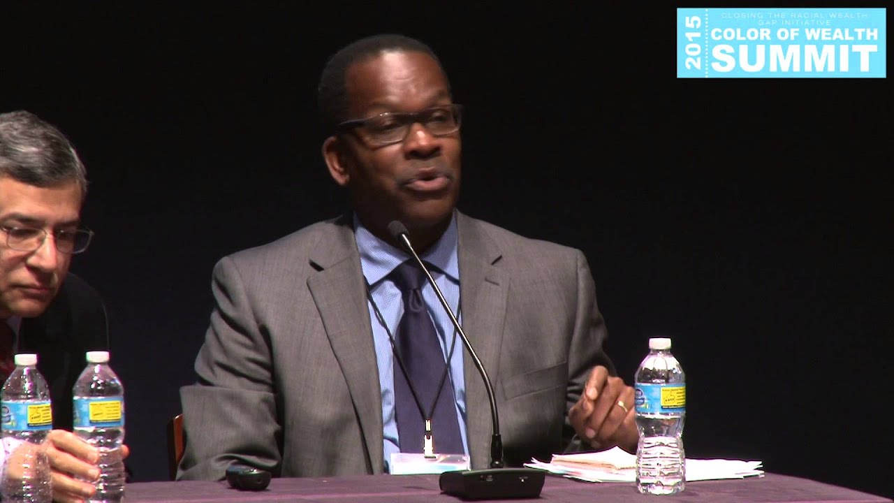 Michael A. Fletcher on The Great Inequality Debate panel at 2015 Color of Wealth Summit