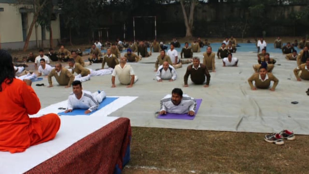 ACHARYA PURNADEVANANDA AVADHUTA REPRESENTING ANANDA MARGA TEACHING YOGA AND MEDITATION AMONG C.I.SF