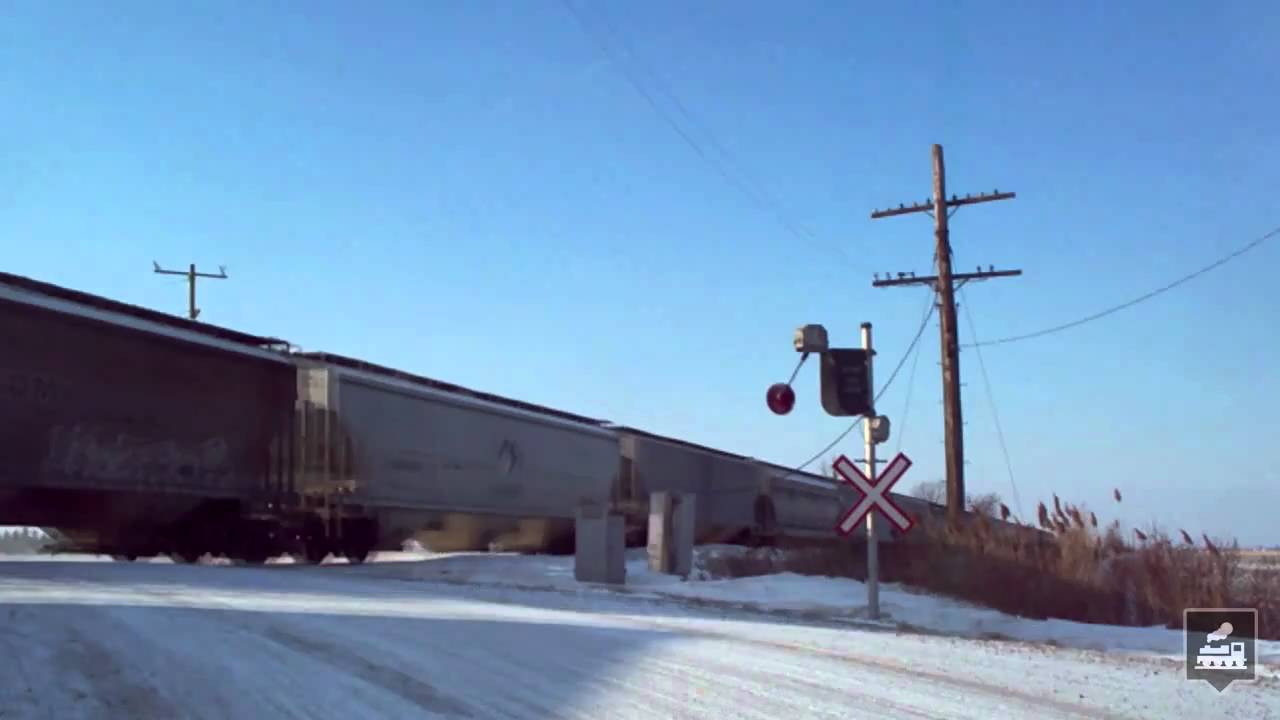 Modern Train Passes Old Style Wigwags