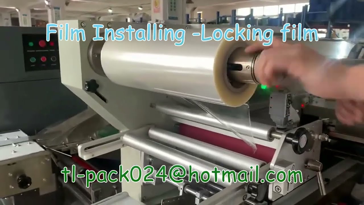 How to Operate 400 flow pack machine,Flow pack machine Film Installing and Film adjusting