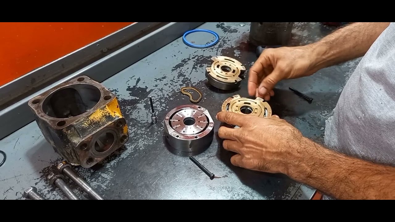 Troca reparo da bomba hidráulica do trator 7D
