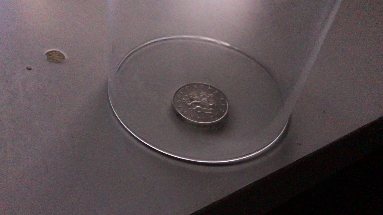 What happend with coin in vacuum?