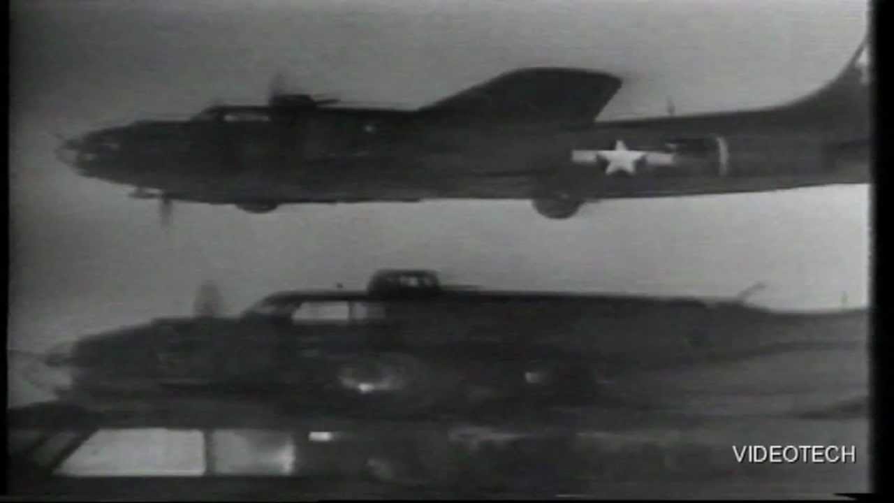 B-17s  FROM THE 303RD BOMB GROUP IN CLOSE FORMATION DURING 1944 ON A MISSION.