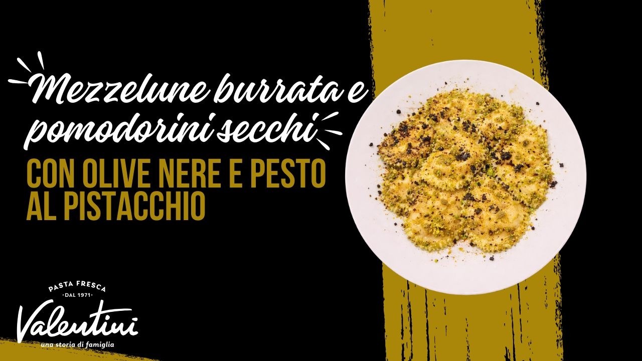 MEZZELUNE AI POMODORINI SECCHI E BURRATA: con pesto al pistacchio e olive nere