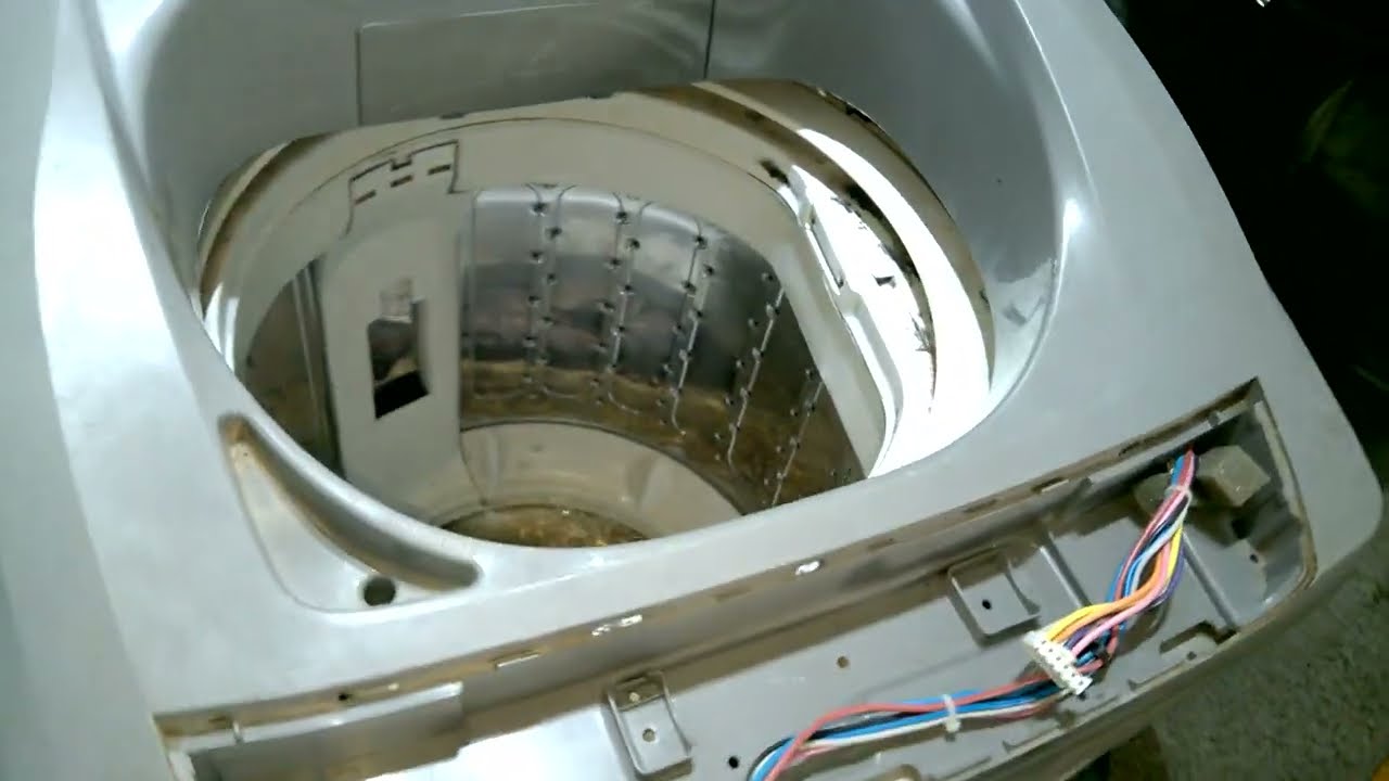 Cambio de caja de transmisión lavarropas carga superior. Video 2