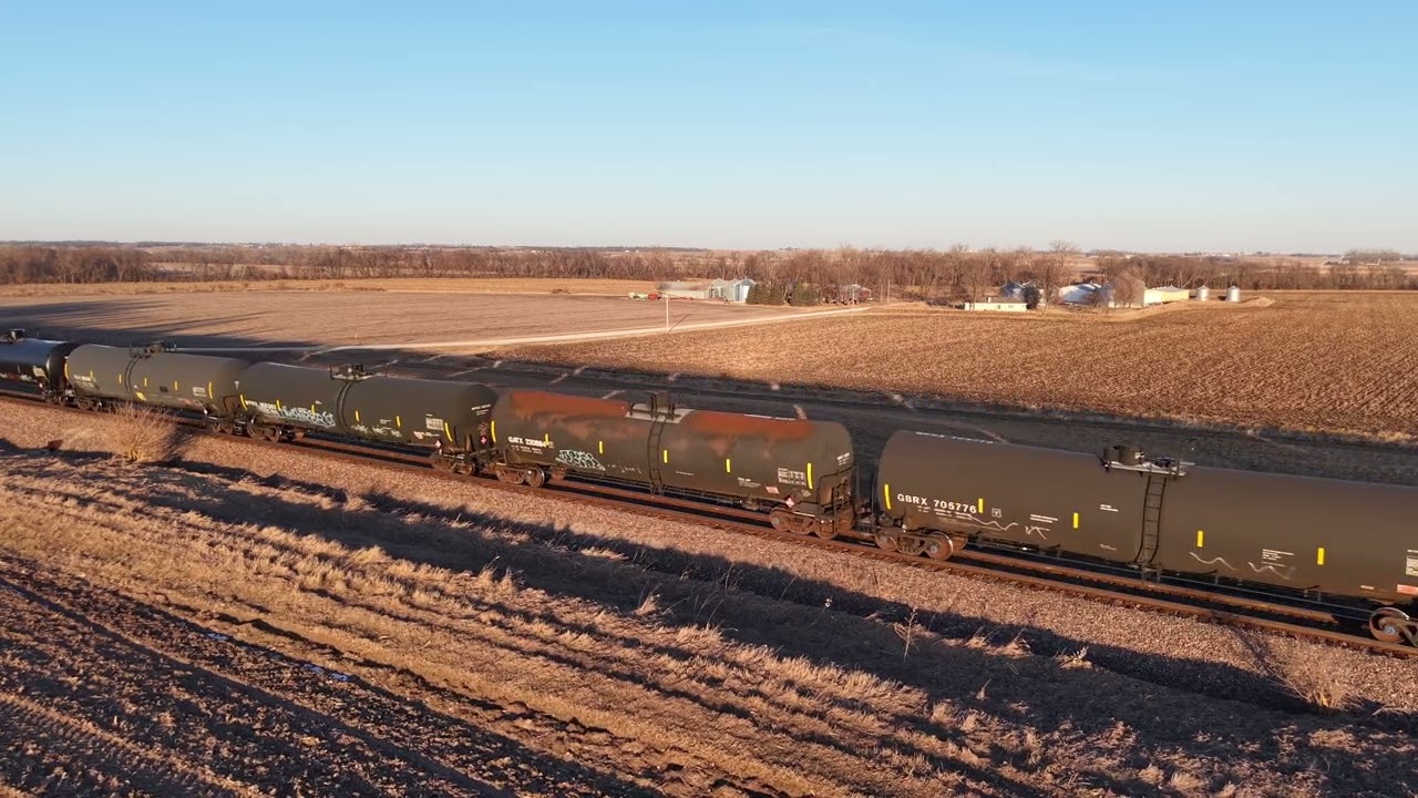 Drone video of southbound Union Pacific tanker train south of Cambridge, Iowa on the Spine Line