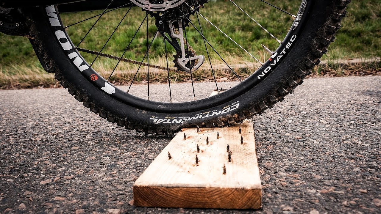 Flat Tire Long Jump Challenge - MTB NAGELBRETT CHALLENGE!
