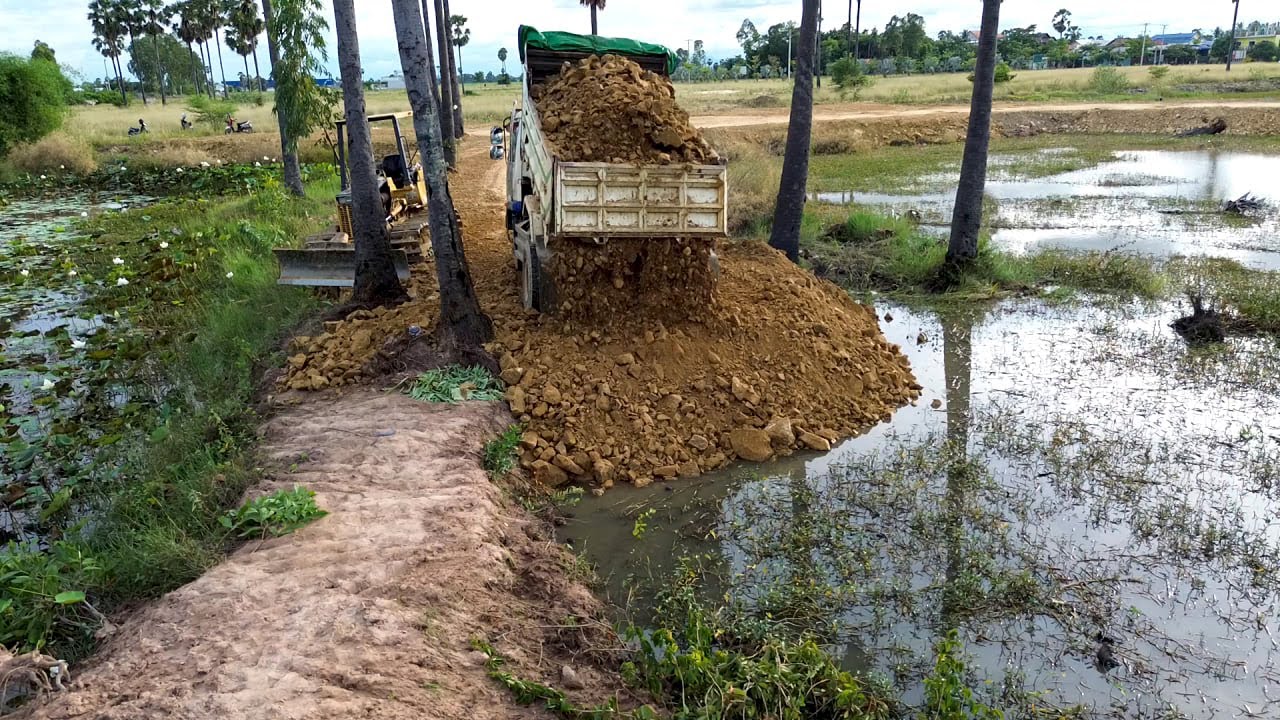 Be Watchful !! Amazing Operator Komatsu Bulldozer Pushing Stone Making Road Narrow Passage Truck 5T