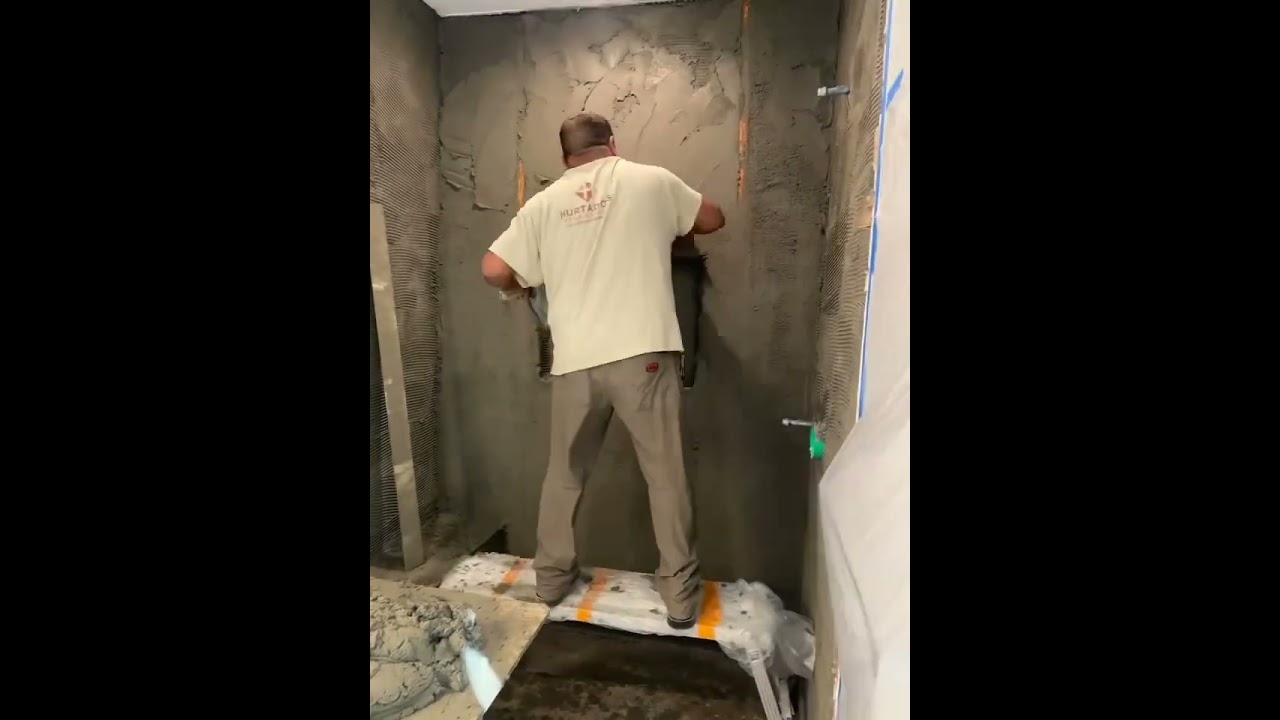 Floating Shower Walls With Cement Brown Coat #diy #tutorial #construction #cement #bathroom #shower