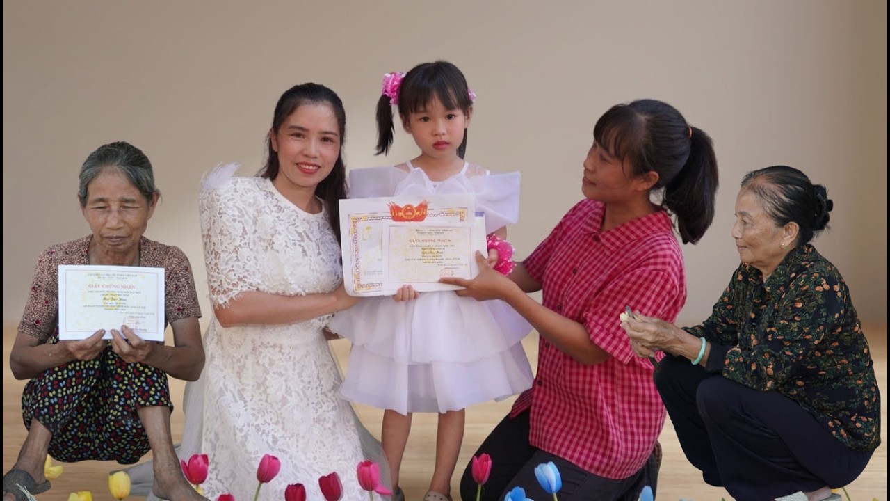 Proud Graduation Day: Maya Receives Certificate of Merit and Scholarship for Overcoming Difficulties