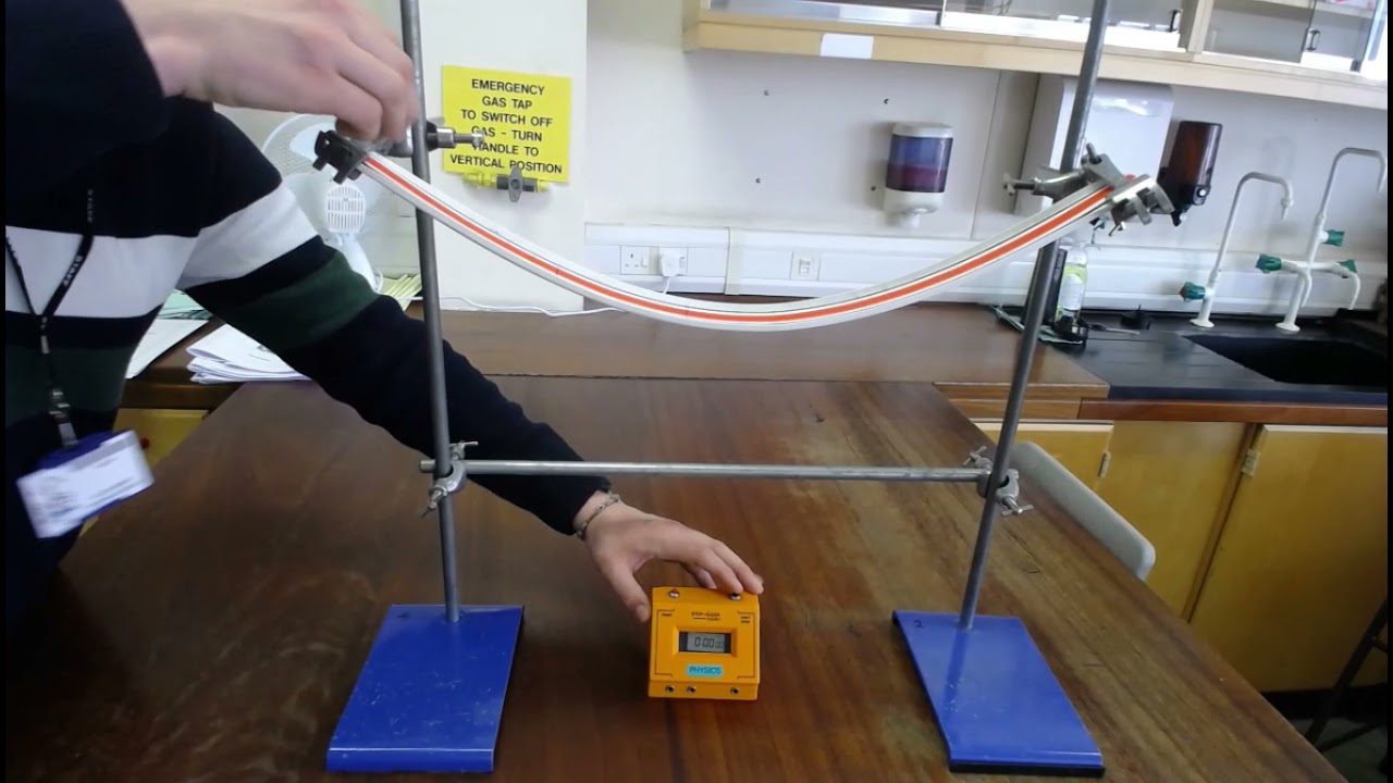 Measuring the Speed of a Marble on a Curved Track