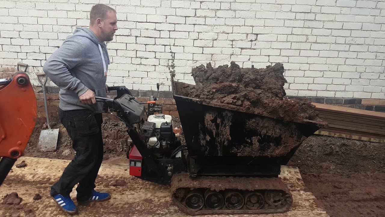 Honda TD500 HL tracked mini dumper and micro Kubota k008-3 digging in clay