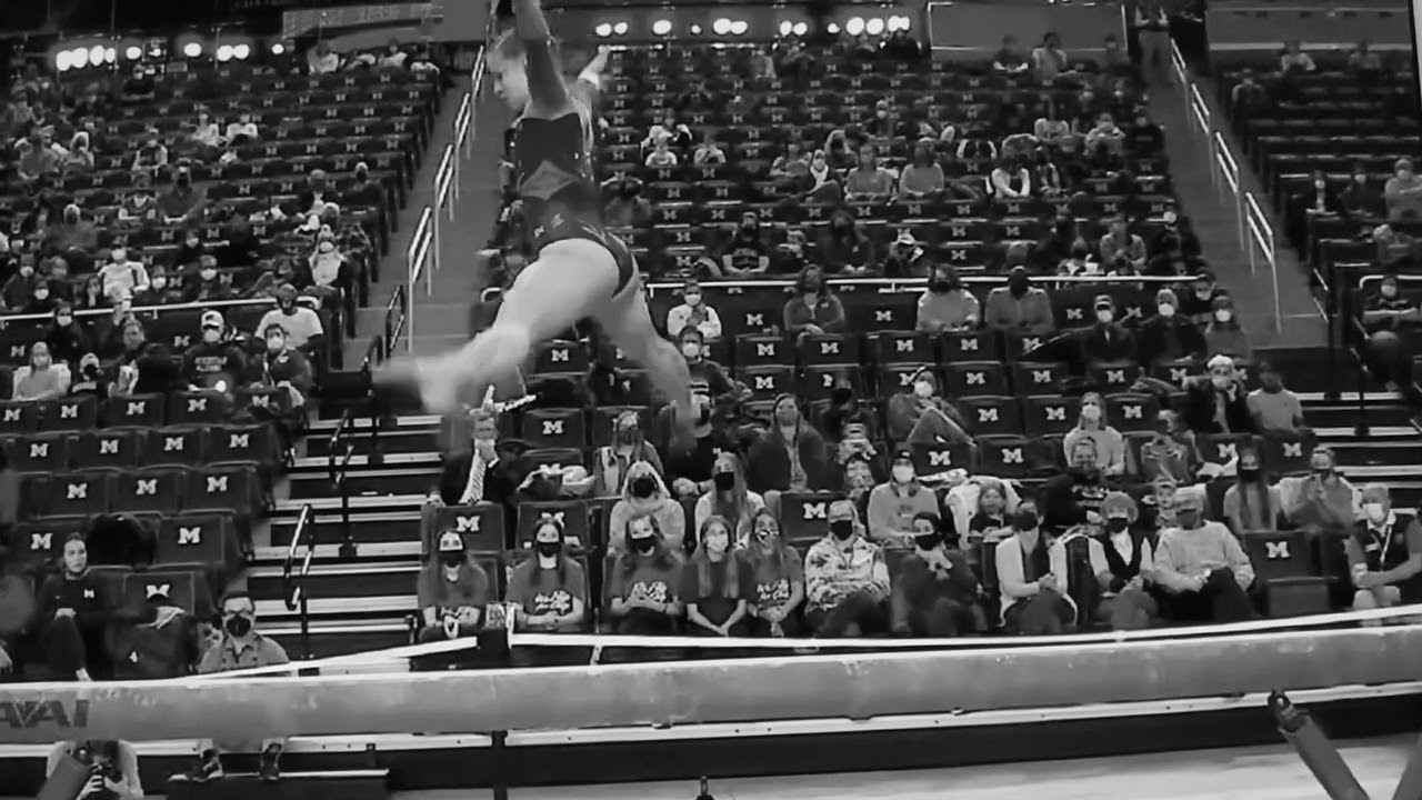 Side Split Jumps with Half Turn on Beam