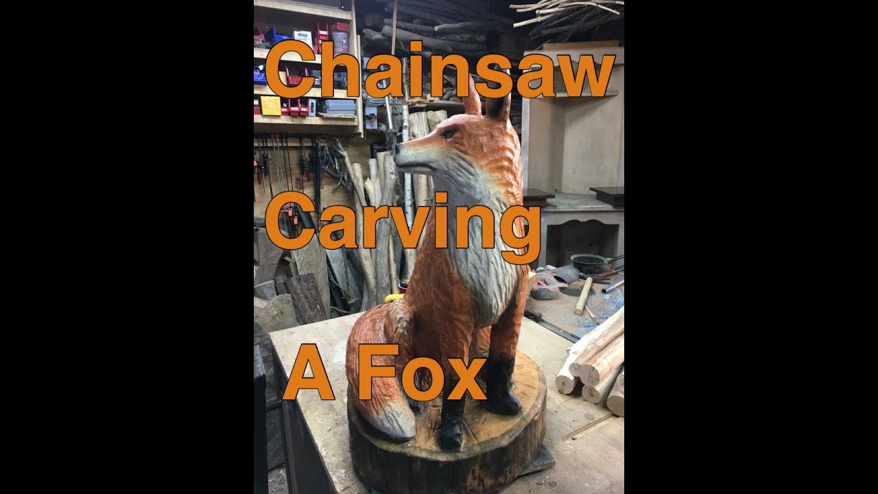 Chainsaw carving a Red Fox