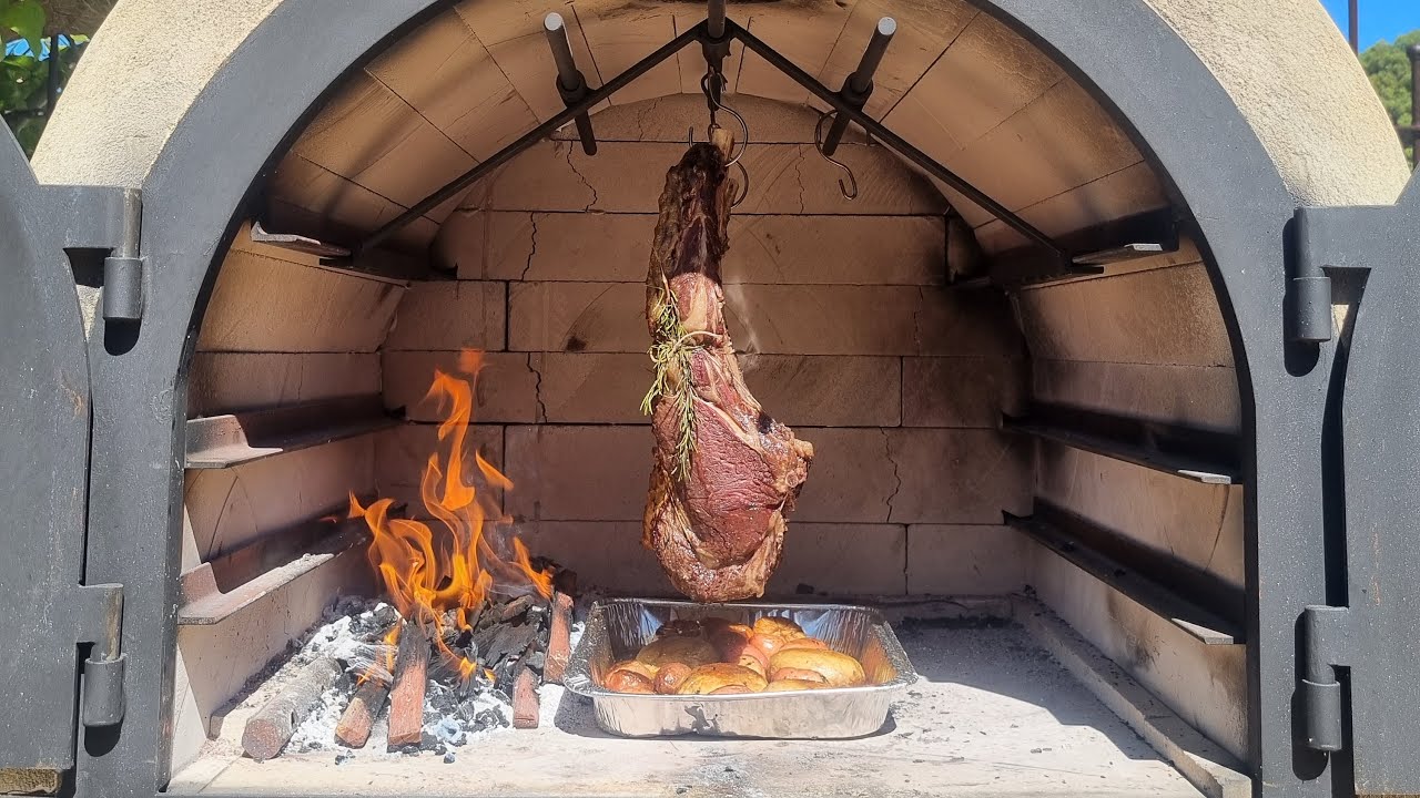 Tomahawk steak cooked in a Supreme Wood Fired Oven 