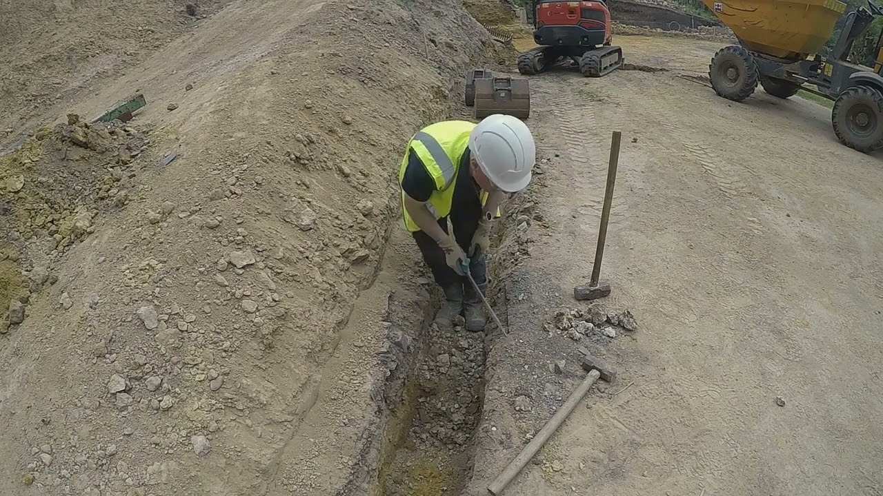 digging small service trench for telecom & electricity