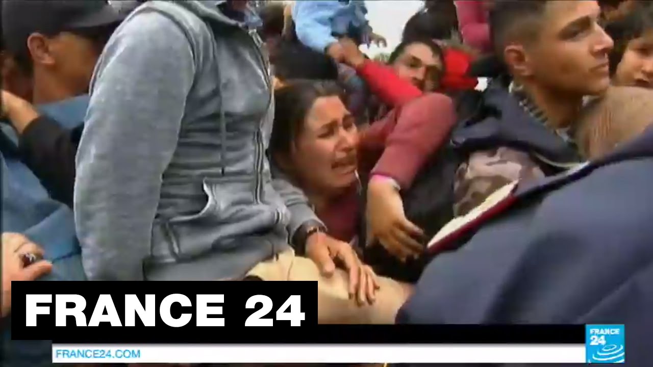 Hungary: shocking footage shows Hungarian police throwing bread at desperate refugees