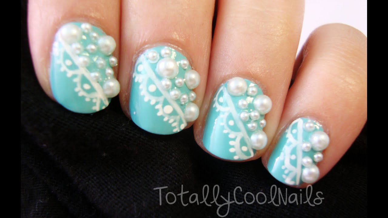 Elegant Lace and Pearl Nail Art