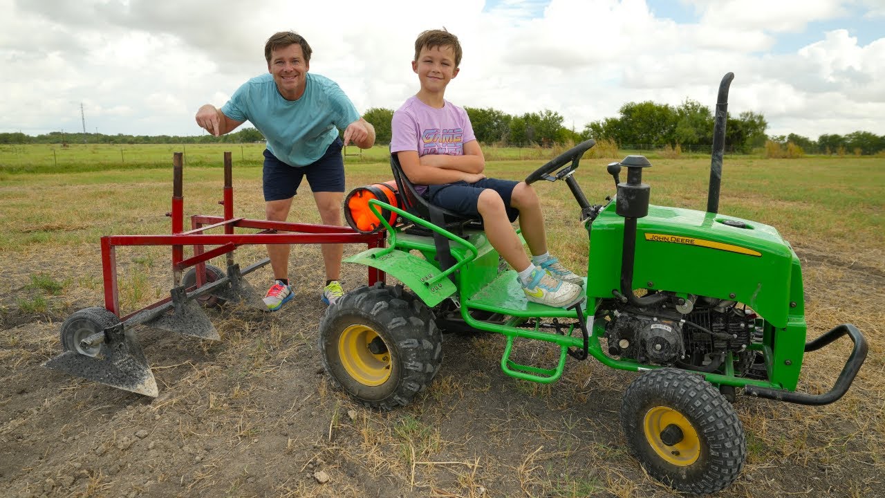 Digging TONS of dirt with Hudson's new plow | Tractors for kids