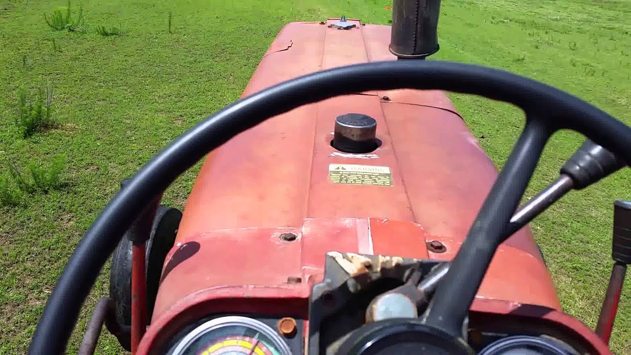 Bushhoging with a1976 International 666.