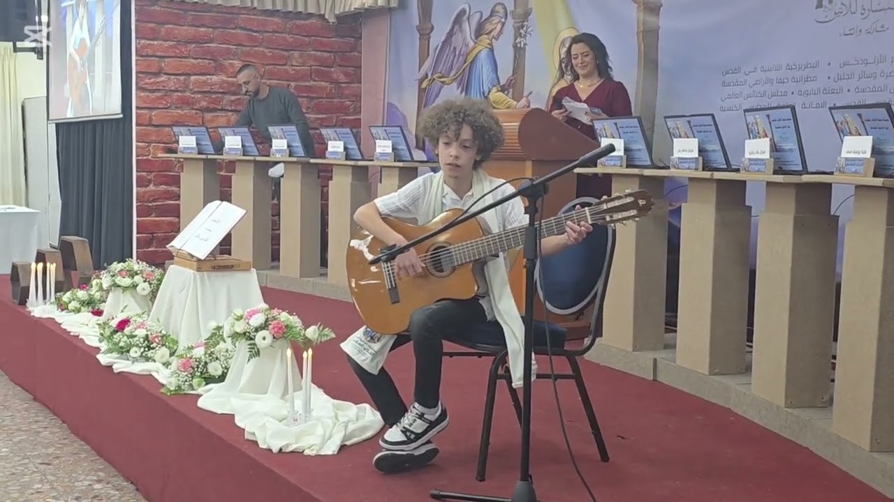 عزفي في امسية مسابقة الكتاب المقدس لمعزوفة ميلاجينيا (playing malaguena by Majd J Matar)