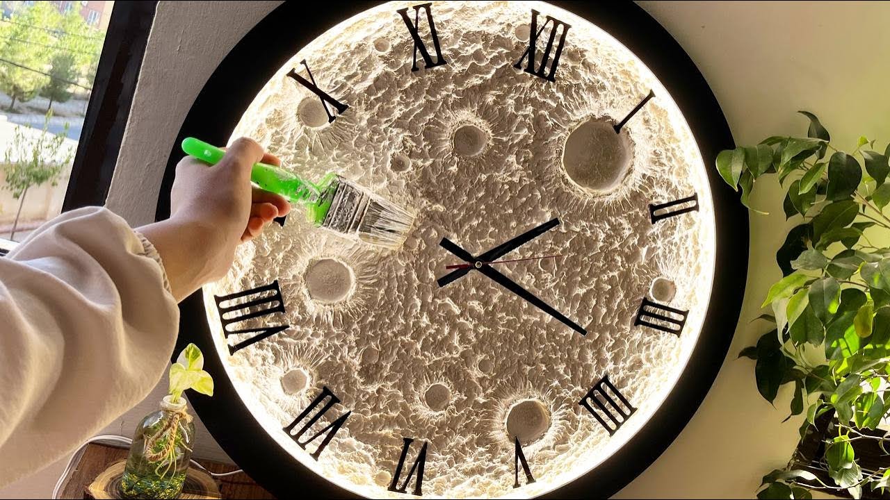 Teaching decorative wall clocks with a prominent moon design