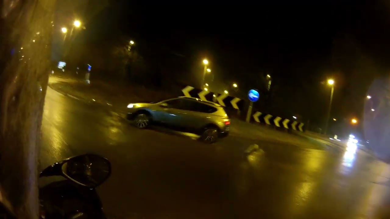 Idiot overtaking on solid white lines in horrendous weather