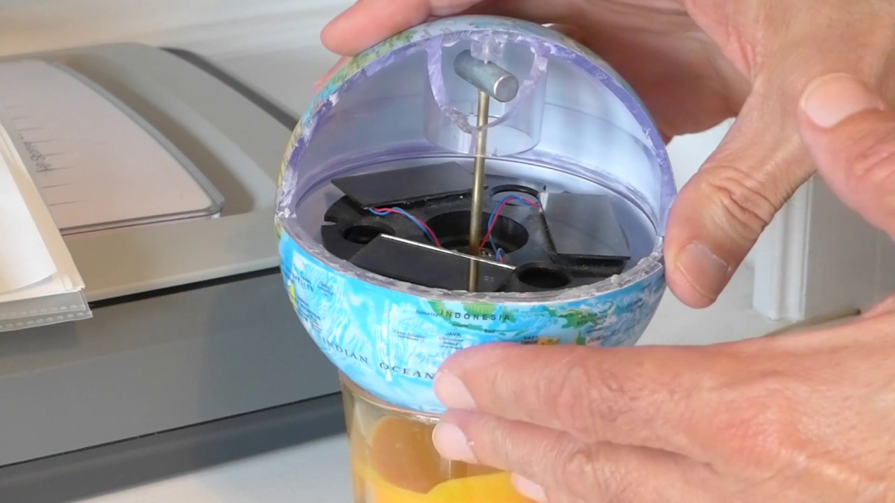 Mova Globe cut open reveals powerful magnet. Why? Its ingenious purpose.