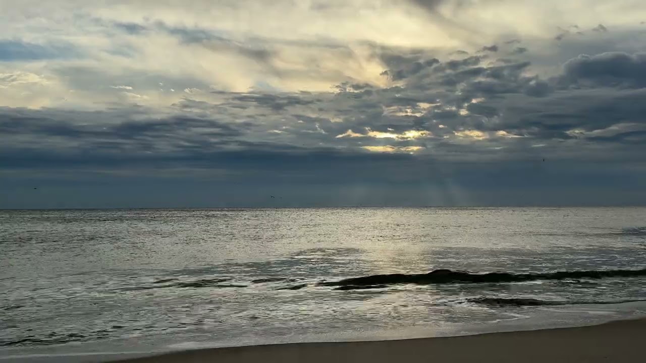 Morning light shifting through the clouds over the ocean #capecod