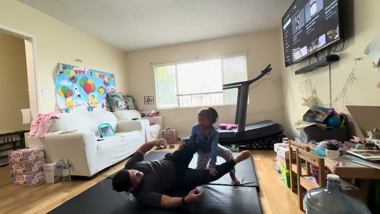 Playing jiujitsu with dad