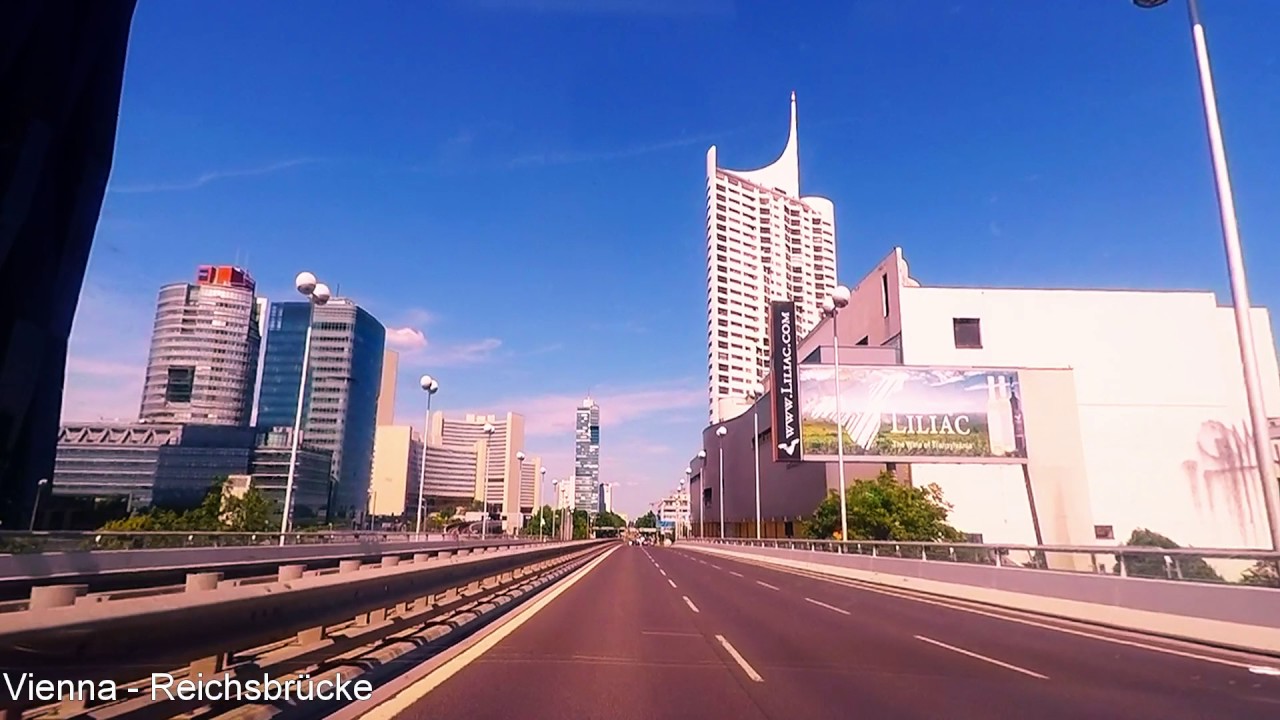 Vienna - Reichsbr&uuml;cke - Beautiful sunny day driving through the Bridge