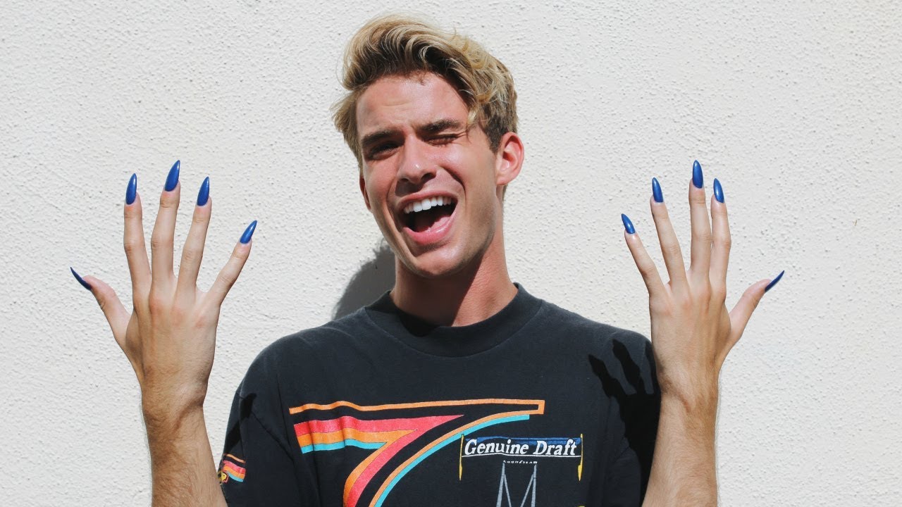 BOY TRIES FAKE NAILS