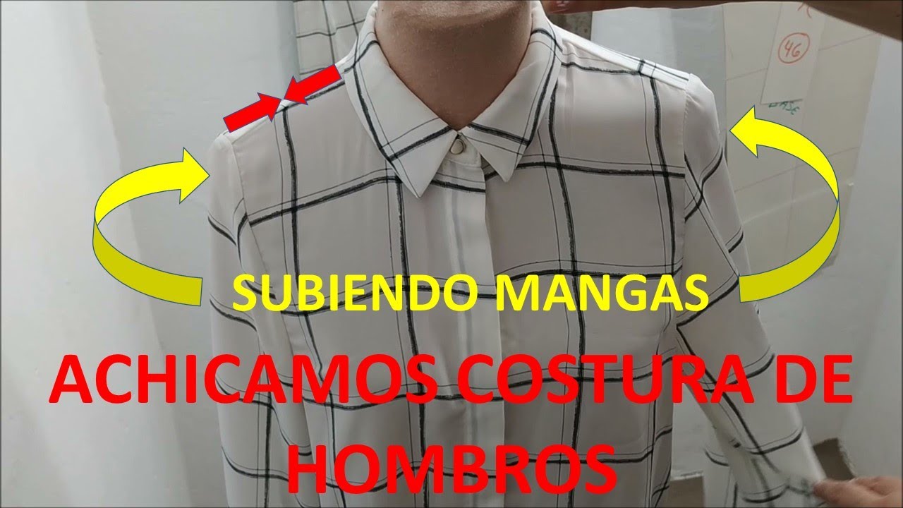 Achicar costuras de hombro a camisa subiendo las mangas.