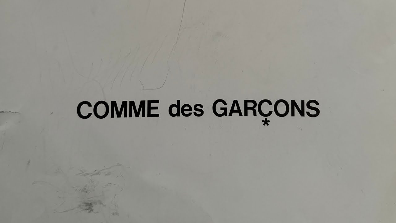 История Comme des Garçons