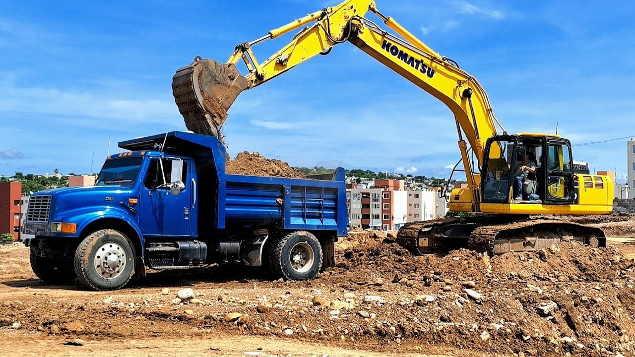 Komatsu Excavators Load Dump Trucks Non-Stop