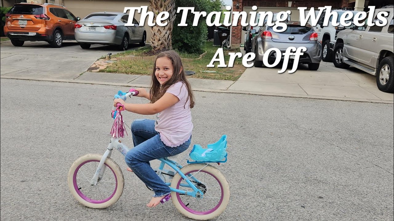 Glama Teaches Petrova How To Ride Her Bike