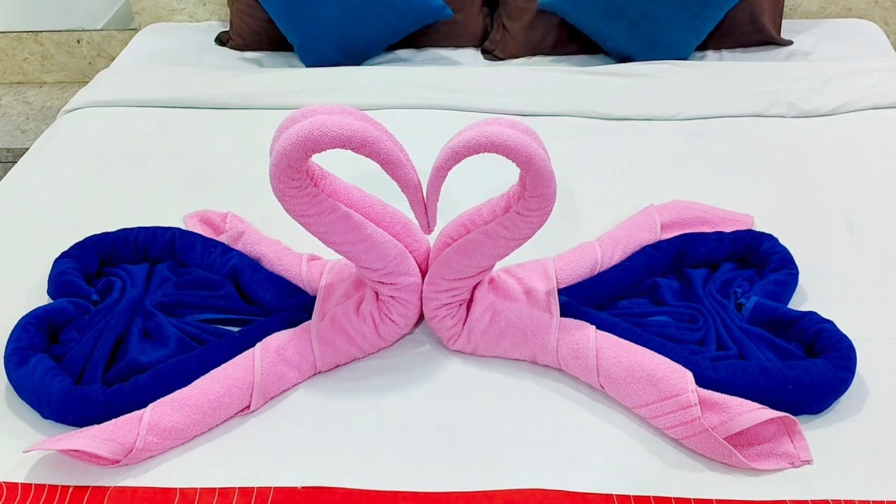 How to make towel folding bed decoration //towel folding swan//towel art origami#viral#youtubevideo 