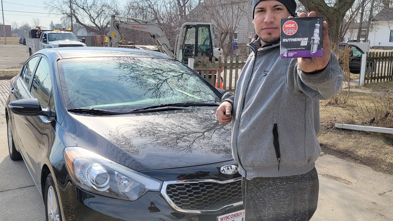 2014 kia forte como cambiar las bujias