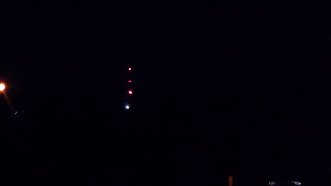 2 radio towers on night mode