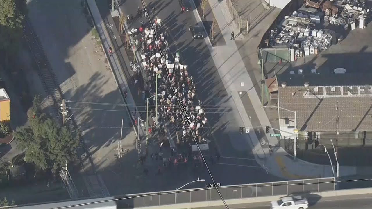 Protesters march to CA Coast Guard base where federal agents are station