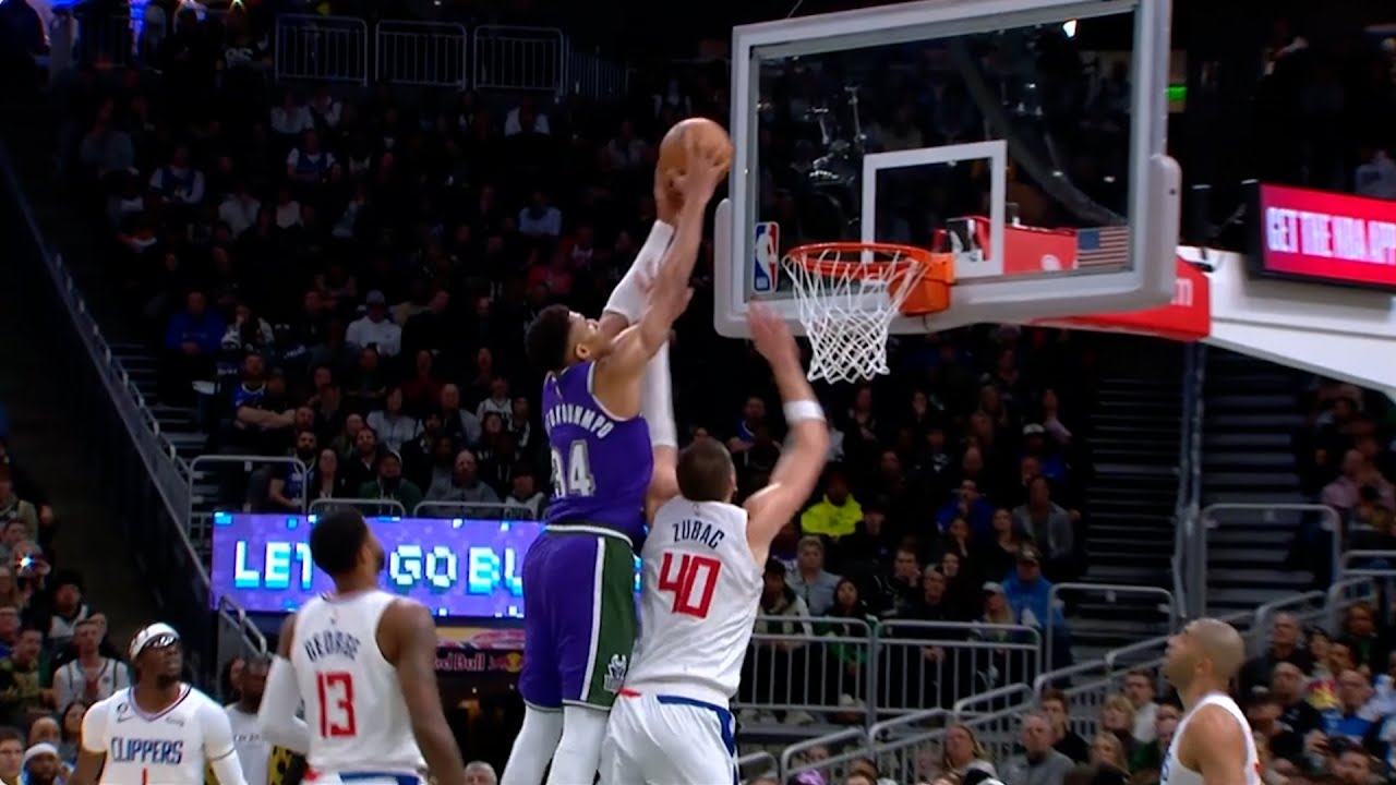Giannis Antetokounmpo made the Bucks bench go crazy after this wild putback dunk over Ivica Zubac