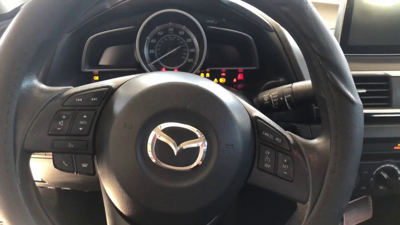 Como instalar camara de reversa a un Mazda 3 2014-2018 | Autos Martínez