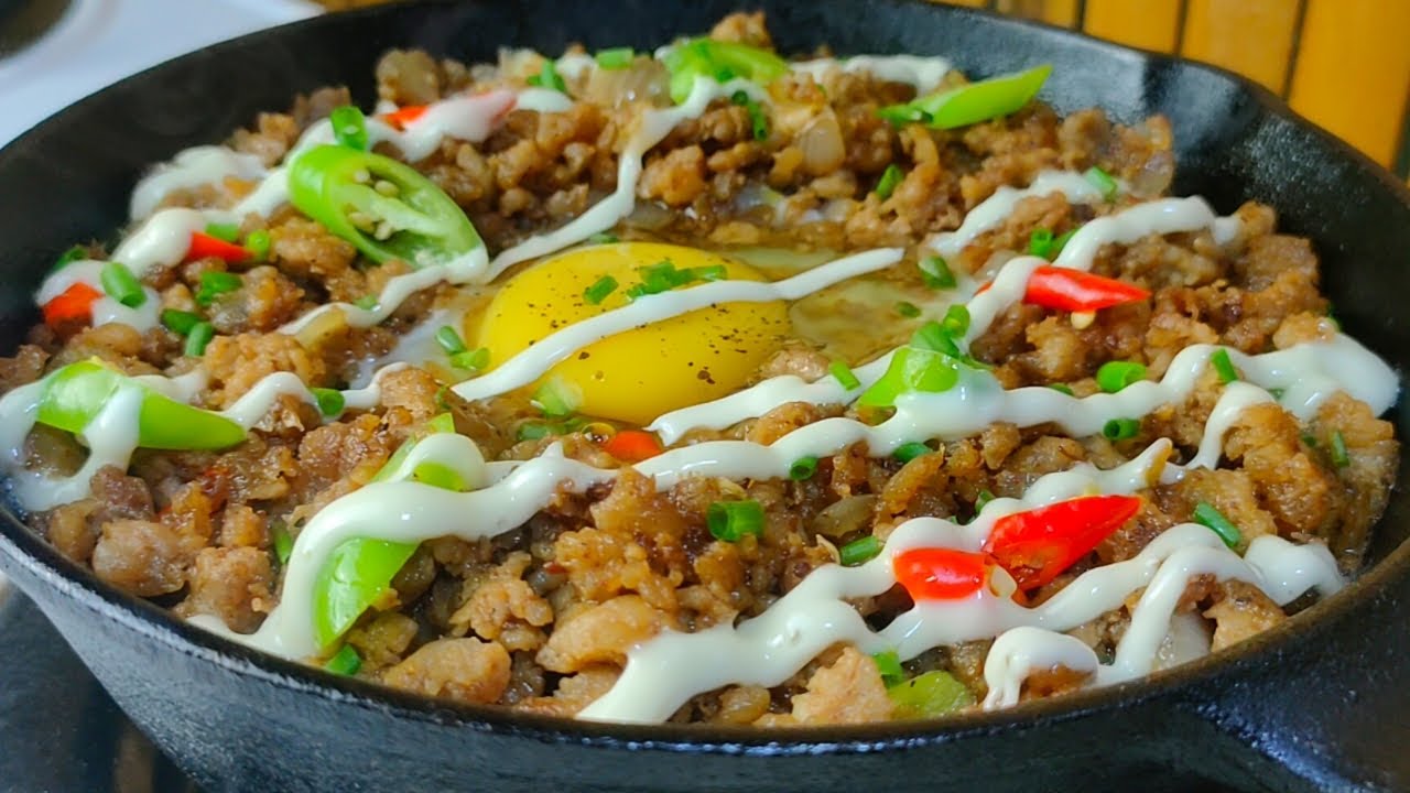 Masarap na Pork Sisig na hindi mo na kailangang magpalambot ng karne, ihawin o iprito pa!