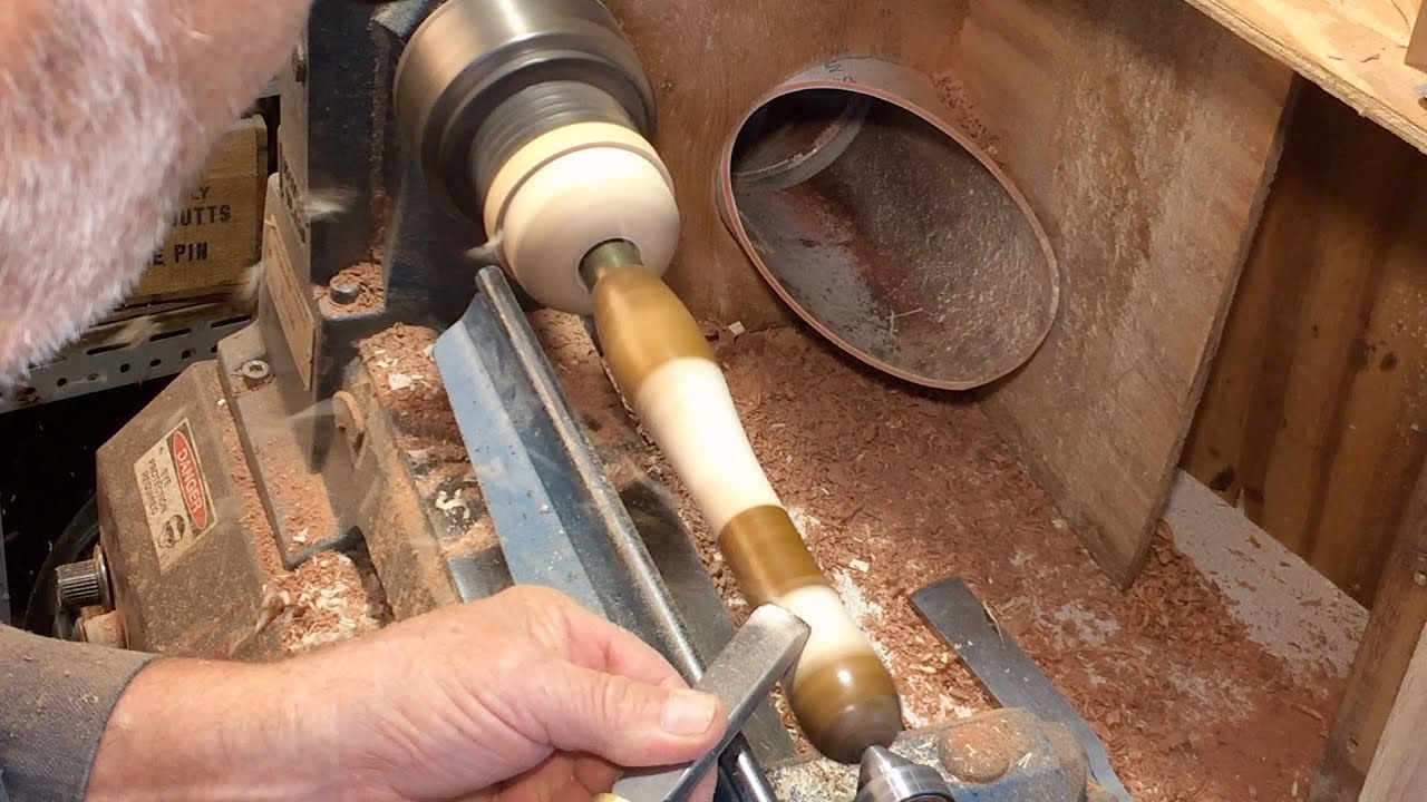 Richard Raffan reshapes a tool handle