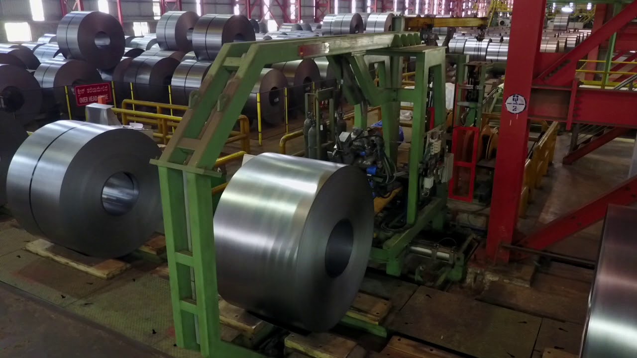 COLD ROLLED STEEL COIL STRAPPING MACHINE